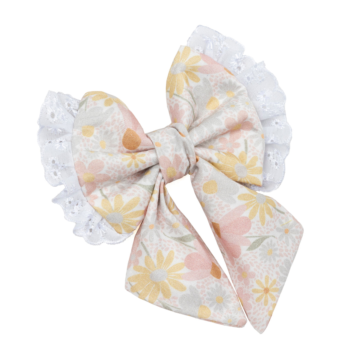 A decorative fabric dog bow featuring a pastel floral print with yellow, pink, and orange flowers on a light beige background, finished with white lace trim on both sides, shown against a plain white background.
